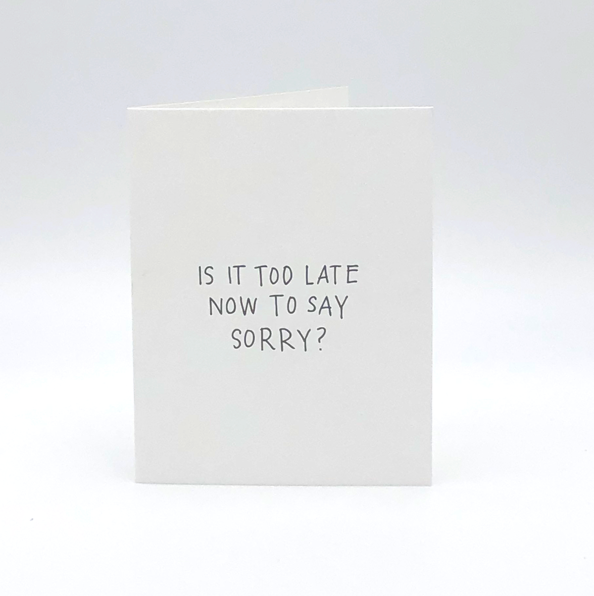 Is It Too Late Now To Say Sorry? Letterpress Greeting Card by Printerette Press with black handwritten font.