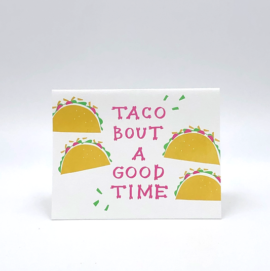 Detailed view of the colorful taco illustrations and 'Taco 'Bout a Good Time' text on the letterpress card.